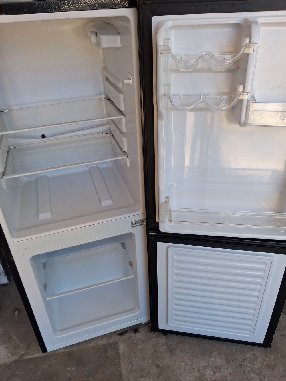 Compact Two-Door Refrigerator Freezer - White Interior, Black Exterior